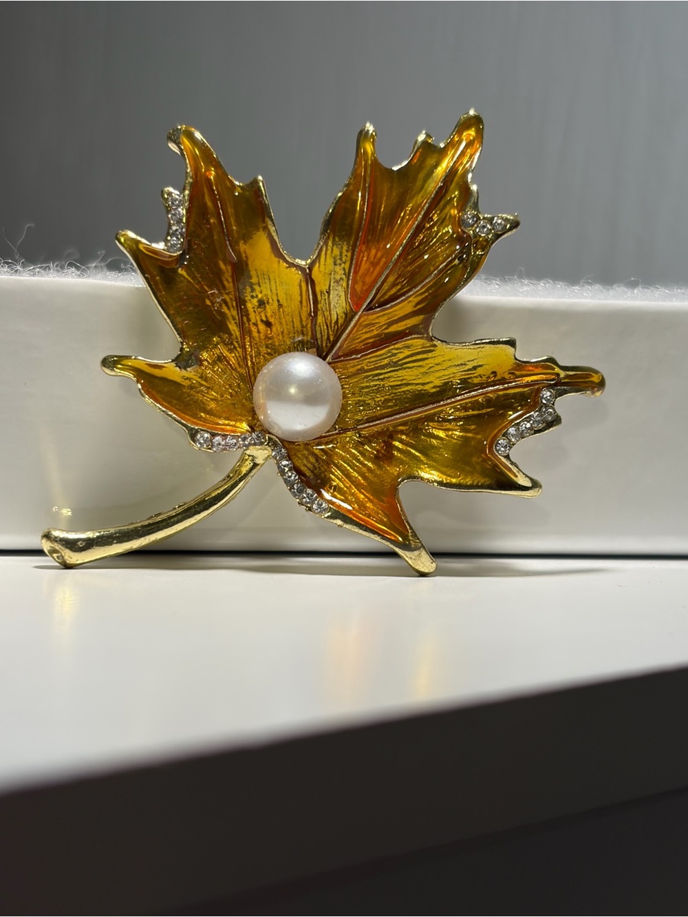 Golden Maple Leaf Brooch with Pearl Accent